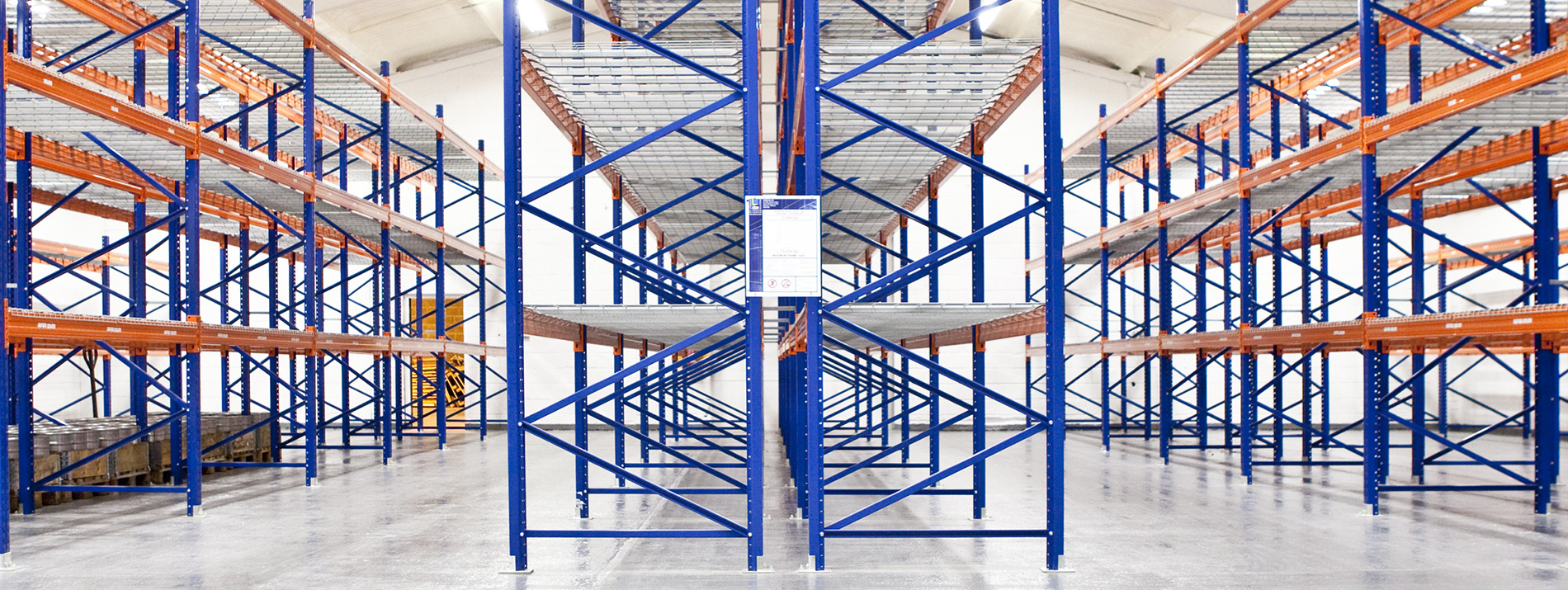 services-warehouse-label-install-racks-orange-warehouse-brand-new-dls